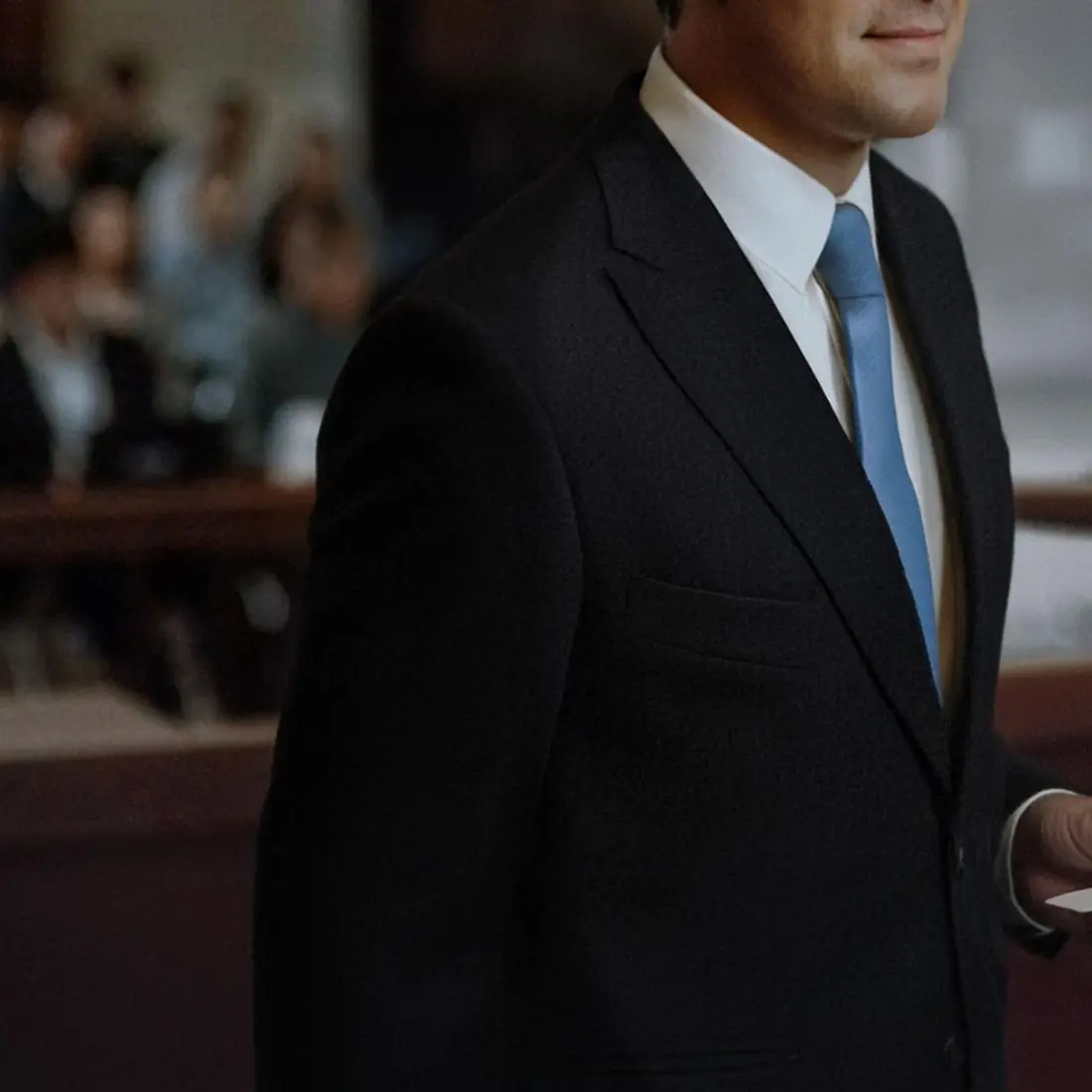 Lawyer in a suit in a courtroom